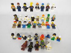 Lego - A group of 40 x loose Lego figures including Batman, they appear mostly in Good condition.