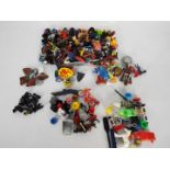 Lego - A case of loose Lego accessories including a quantity of hats, weapons, shields, paddles,