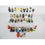 Lego - A group of 40 x loose Lego figures including a Star Wars Storm Trooper and Luke Skywalker,