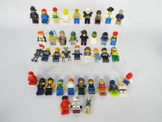 Lego - A group of 40 x loose Lego figures including a Star Wars Storm Trooper and Luke Skywalker,