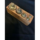 SET OF 5 CASED EARLY 20TH CENTURY FRENCH BRASS SHOP WEIGHTS