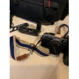 OLYMPUS OM10 CAMERA & OVER 20 PHOTOGRAPHIC ACCESSORIES