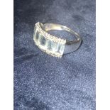 9 CARAT WHITE GOLD AQUAMARINE & DIAMOND RING SIZE K