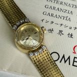 1969 OMEGA LADIES 18 CARAT GOLD & DIAMOND WRIST WATCH WITHPAPER WORK