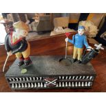 GOLF - CAST IRON GOLFING MECHANISED MONEY BOX