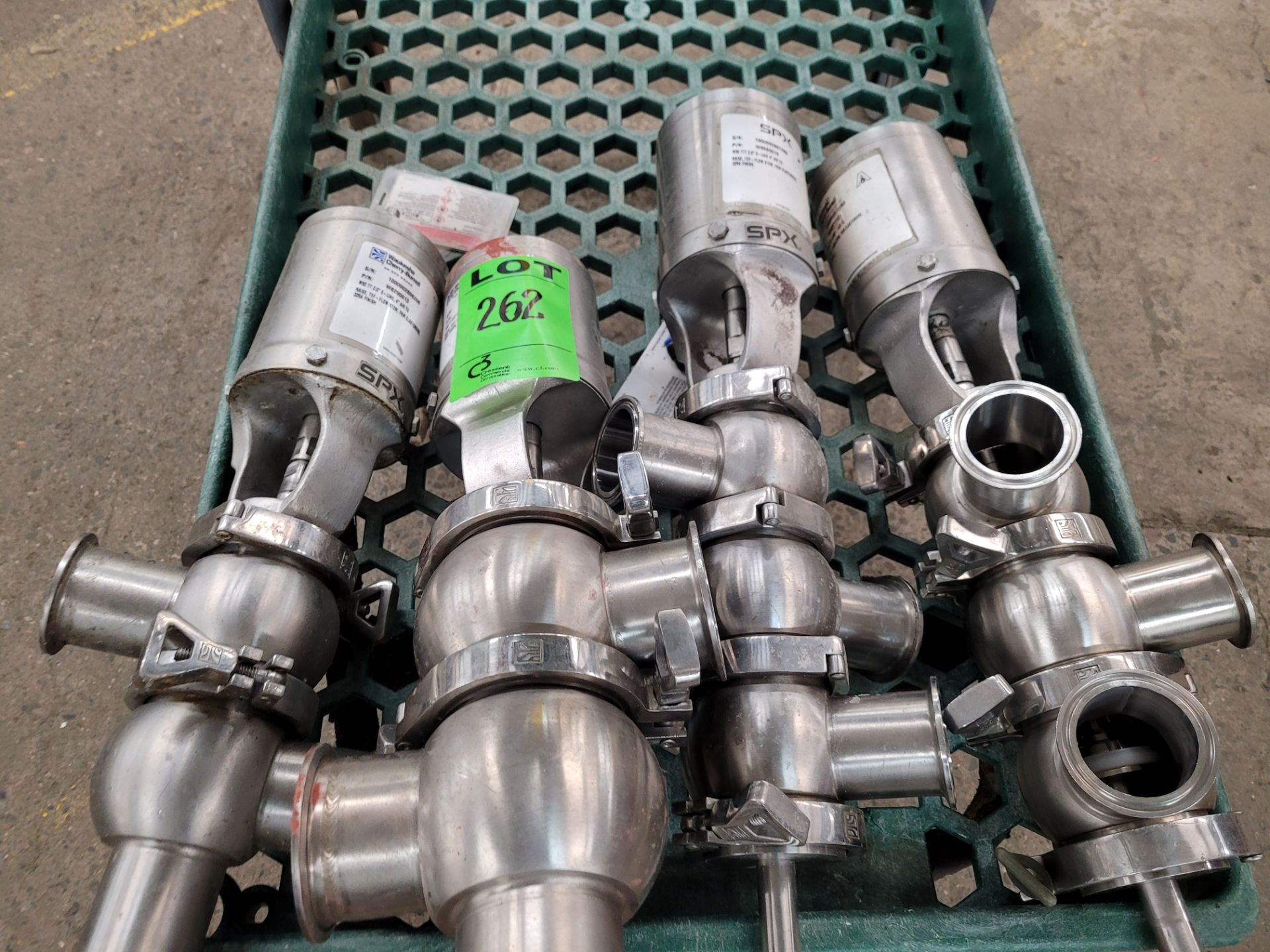 Lot of (4) stainless 3-way actuator valves consisting of (2) 2" valves, (1) 2 1/2" valves, (1) SPX v