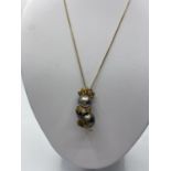 Cat Design pendant with 2 South Sea Pearls & Diamonds on a 14ct Gold Necklace, 10g, 42cm Chain.