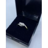 18ct Trilogy Diamond Crossover Ring in 18ct Gold, 3.3g, Size K/L.