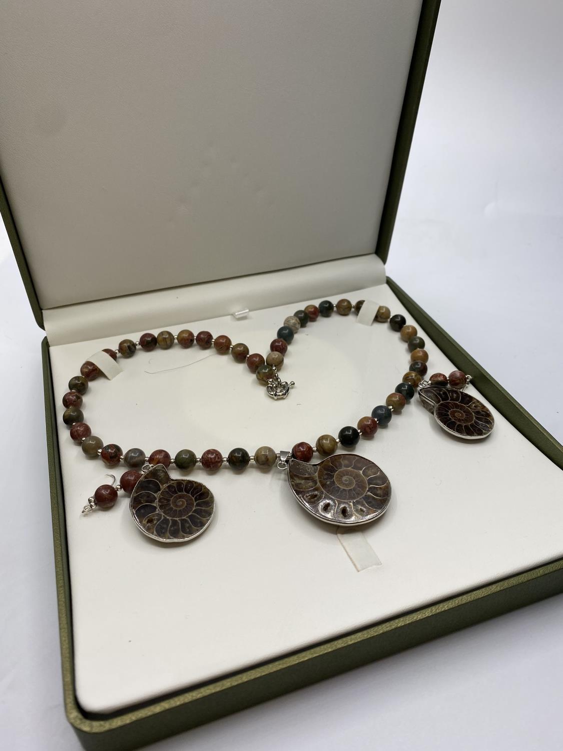 A jasper and Jurassic Fossil Ammonites (163 million years old) necklace and matching earrings from