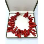 A Red Coral Necklace of Large Proportions with Clasp Marked "925" Weight 344g, Length 50cm. In a