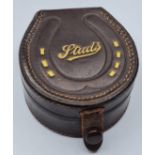 Gentleman's Leather Shirt Stud Box. Horseshoe shaped and having a large selection of mother of