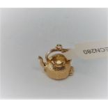 9k yellow gold kettle charm with surprise, weight 3.8g (ecn280)