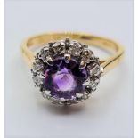 18CT YELLOW GOLD DIAMOND AND AMETHYST CLUSTER RING, WEIGHT 4.8G. SIZE N