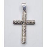 9CT WHITE GOLD DIAMOND SET CROSS, WEIGHT 16.1G. length 5.5cms