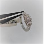 9k white gold cluster ring with 0.27ct diamonds, weight 2.5g and size L1/2 (ECN479)