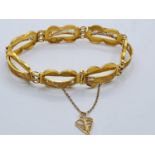 18ct gold filigree bracelet, weight 14.7g and 24cm long approx