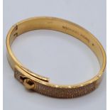 MICHAEL KORS G/P STONE SET BANGLE