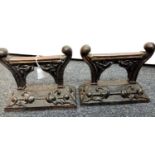 Pair of antique cast iron and copper fire dogs