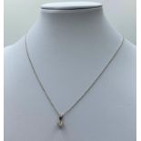 0.33ct diamond pendant set in 18ct white gold with a 18cm gold necklace, weight 2.28g