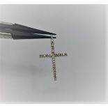 9k white gold cross with 0.15ct diamonds, 26mm long and weight 1.2g approx (ecn455)