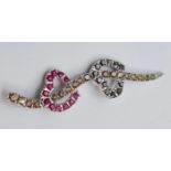 18ct white gold double heart pendant with diamonds and ruby's, weight 5.4g & length 5cms