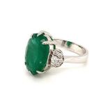 18k white gold ring with 7.07ct oval Zambian green emerald and 0.20ct diamonds (G/I, SI), weight 6.