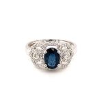 18k white gold crown designed ring with 1.20ct oval natural blue sapphire (Madagascar) and 0.30ct