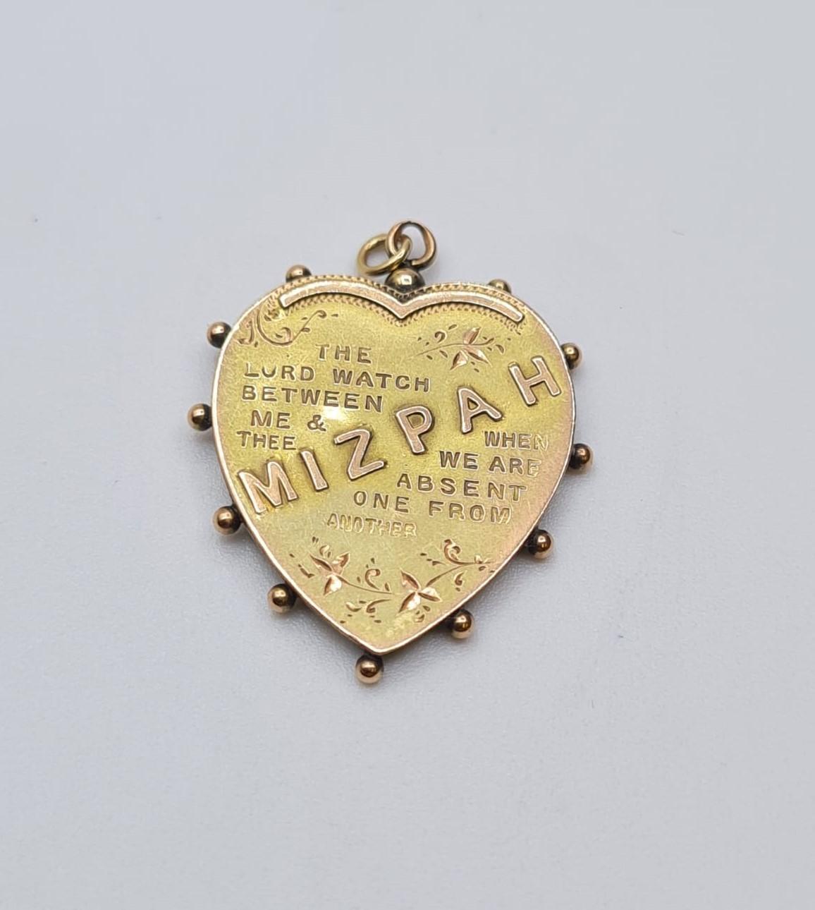 Victorian 9ct gold "Mizpah" heart shaped pendant. Weight 0.95g and length 2.5cms