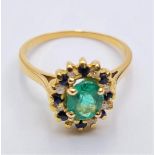18ct gold emerald, diamond and sapphire ring. weight 3.3g & size M