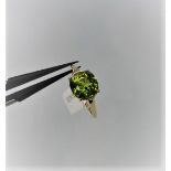 10K yellow gold ring with 3.23ct peridot, weight 2.2g and size P1/2 (ECN184)