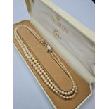 A double string of graduated pearls in presentation box