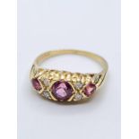 9CT YELLOW GOLD DIAMOND & PINK SAPPHIRE RING, WEIGHT 2.9G. Size O