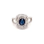 18k white gold halo ring with 1.15ct oval natural dark blue sapphire (Madagascar) double halo and