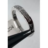 Platinum half eternity ring with 0.40ct diamonds (top quality princess cut) weight 6.60g and size R+