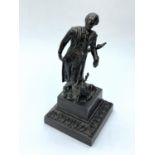 Small bronze statue of a man and deer, 14cms tall and weighs 564g.