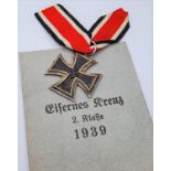 WW2 German Iron Cross 2nd Class EK2. 3 part construction with iron core. In original packet of