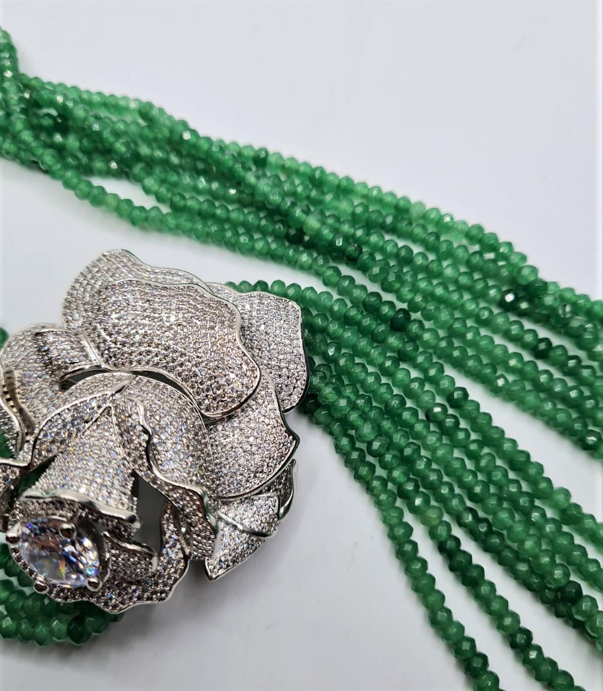 An impressive six row faceted emerald necklace with a white metal and cubic zirconia ornamental - Image 3 of 4