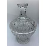 A crystal bowl with lid, 23cms tall and weighs 1.75 kilos