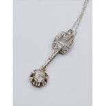 9ct white gold diamond pendant with 0.25ct diamond and diamond encrusting, weight 2.1g and 42cm long