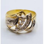 18ct gold ring with inset diamonds and diamond trilogy centre. weight 5.4g and size S