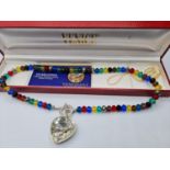 A genuine murano coloured glass necklace with heart shaped pendant in original box