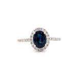 18k white gold ring with 1.20ct oval natural blue sapphire (Madagascar) halo and 0.35ct diamonds (