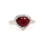 18k white gold ring with 2.30ct trillion shaped Mozambique ruby halo and 0.38ct diamonds (G/I,