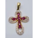 9CT YELLOW GOLD DIAMOND & RUBY SET CROSS, WEIGHT 2G