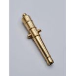 9ct gold miniature cannon lighter, weight 7.2g and length 5cms