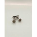 platinum studs with natural champagne diamonds 0.60cts; weight 2g