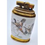 Vintage Ceramic Table Lighter. Having birds to back and front. Flat oval shape, Gilded Metal.