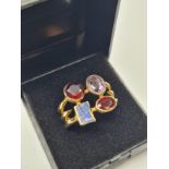 Silver stone set ring having garnets amethyst and agate stones in various shapes. Silver 925, ring