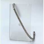 14ct White gold Tennis Bracelet with 8.6ct diamonds inset, weight 12.2g and 18cm long