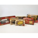 Six Boxed Corgi and Matchbox Commercial Vehicles and a Stephenson's Rocket.